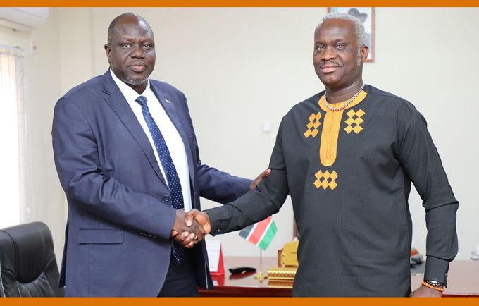 Hon. Peter Gatwech Kulang & Dr. Ademola Olajide shake hands after the meeting 