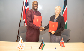 H.E Linken Lymann Berrymann and UNFPA Representative Dr. Ademola Olajide after the signing