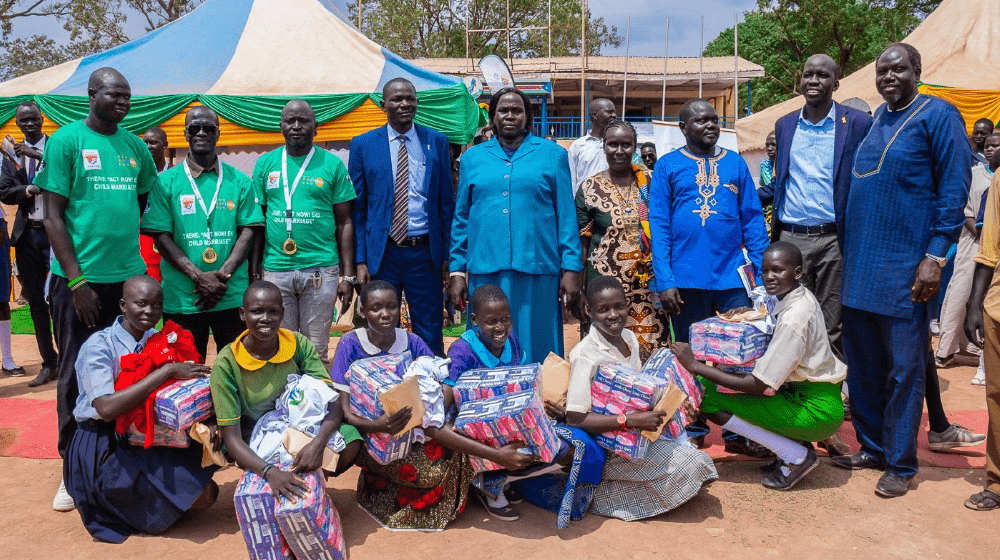 Group photo of officials committing to end child marriage