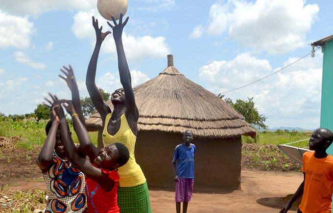 Girls play ball in the Ayilo Refugee Settlement