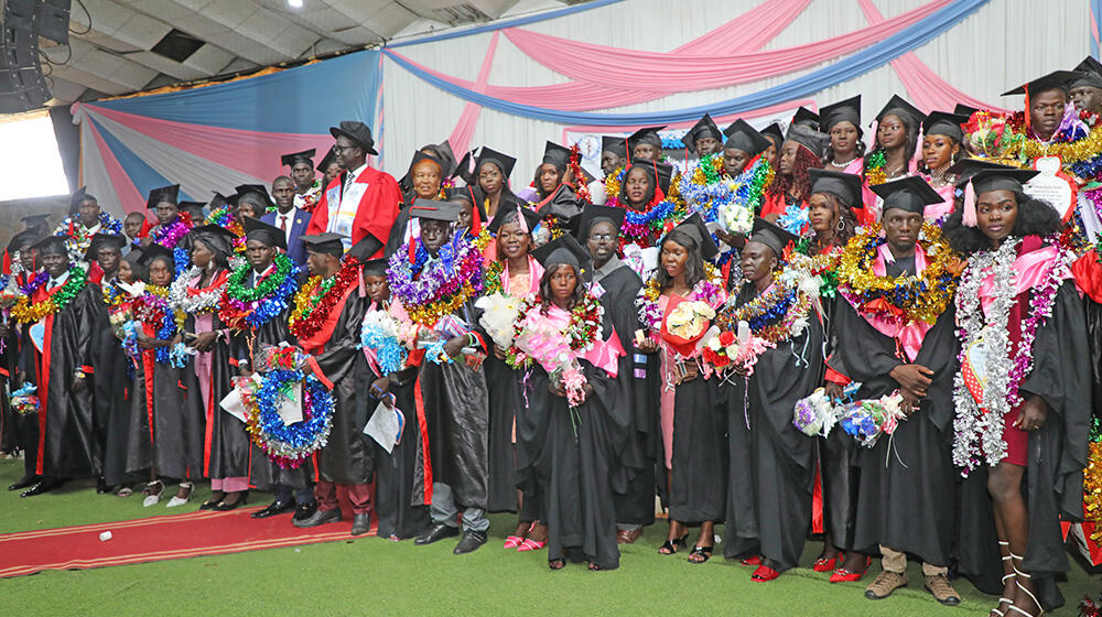 Graduates in a group photo with Hon Dr. Ader Machar Aciek, the Undersecretary of the Ministry of Health