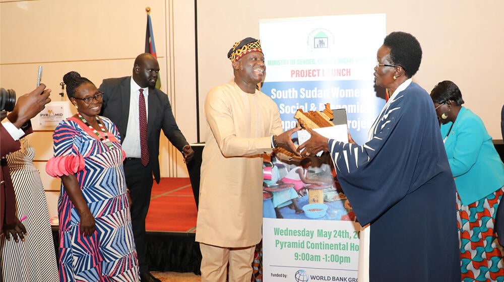UNFPA Country Representative,Dr.Ademola Olajide receiving an award from H.E Mama Rebecca De Mabior